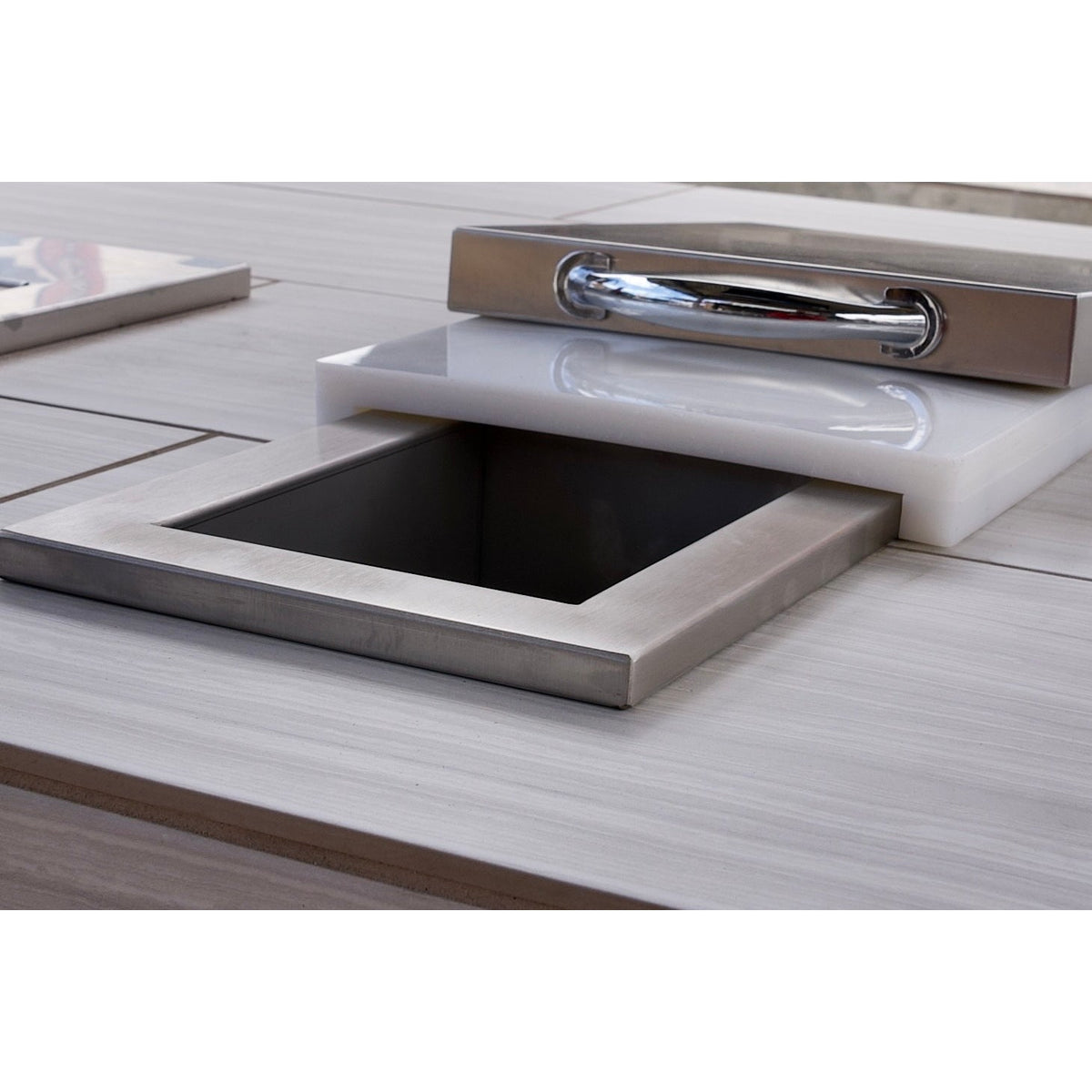 Kokomo trash chute installed in a countertop