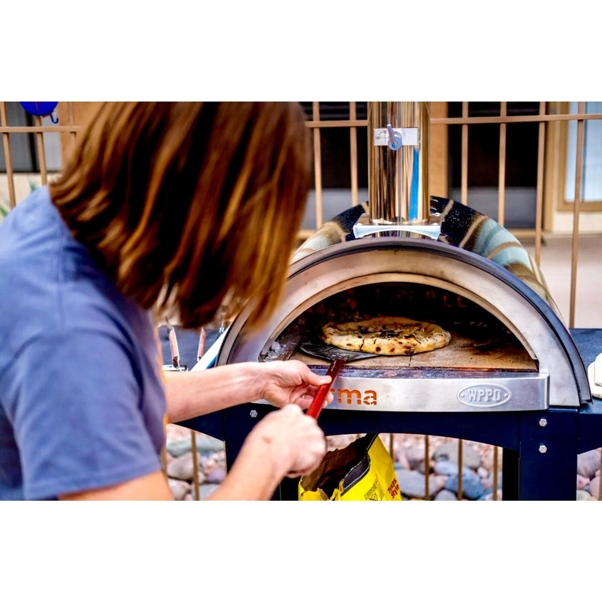 WPPO 7 in Round Turning Pizza Peel With Break Down Handle Lifestyle