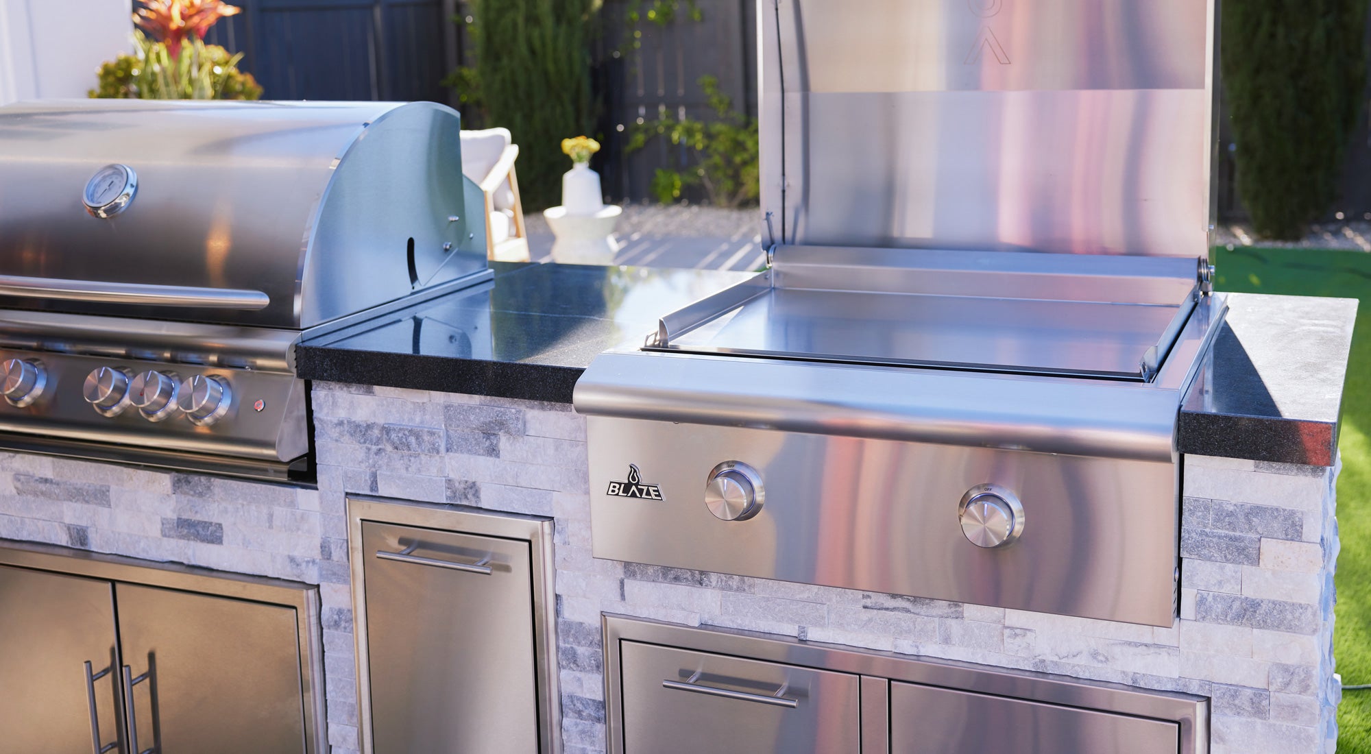 Outdoor kitchen components including side burners and storage