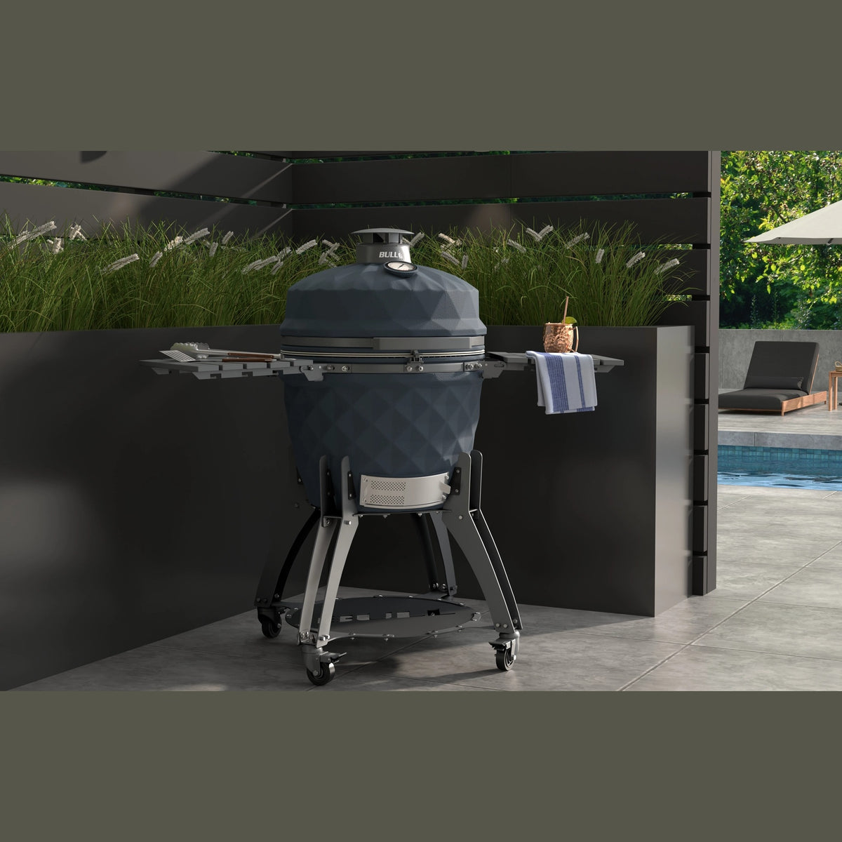 Bull Blackhorn 24" Ceramic Kamado Grill with Cart on a patio